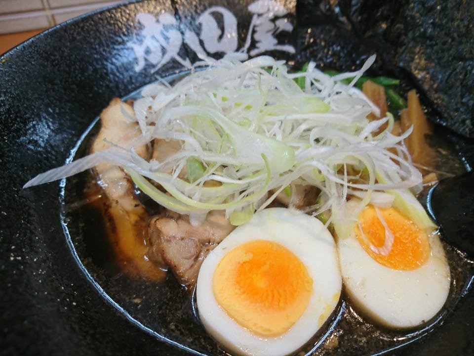 The shop's signature ramen — chashu, marinated egg and nori at Halal Ramen Naniwaya