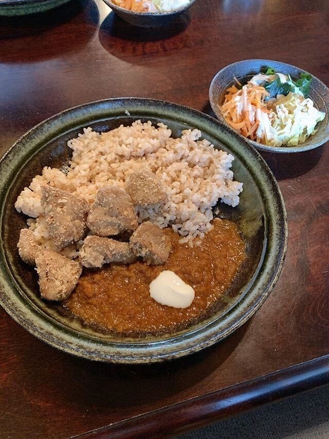 Curry with brown rice, fried chicken and a side of carrot and cabbage salad at Ashura, Kawanokami Tsukinuke-cho