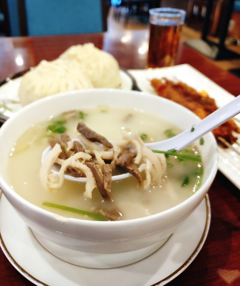 Lamb soup with a steamed bun — qingzhen cooking rather than adapted Chinese food at Aliya Halal Restaurant, Nishi-Ikebukuro