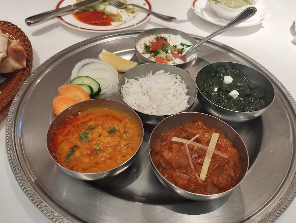 A vegetarian thali with dal, saag paneer and basmati rice at Priya The Indian Restaurant