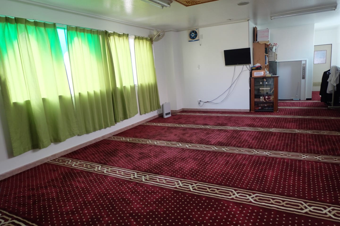 The carpeted main prayer hall at Darul Arqam Mosque, Asakusa