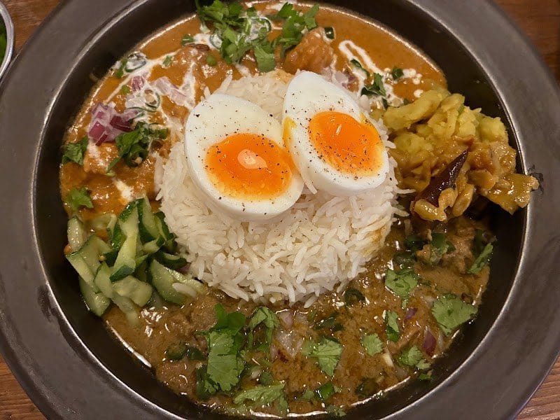 Curry with rice and soft-boiled eggs at Spice Curry and Cafe Halal Hub