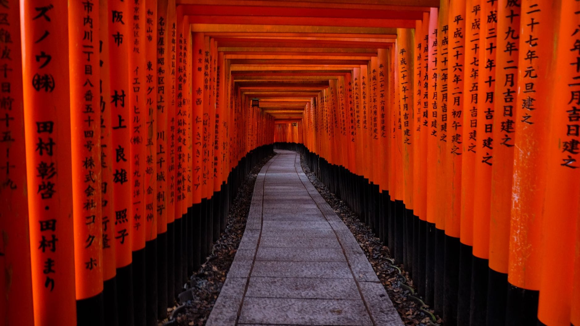 Rows of red torii gates at Fushimi Inari Taisha, Kyoto